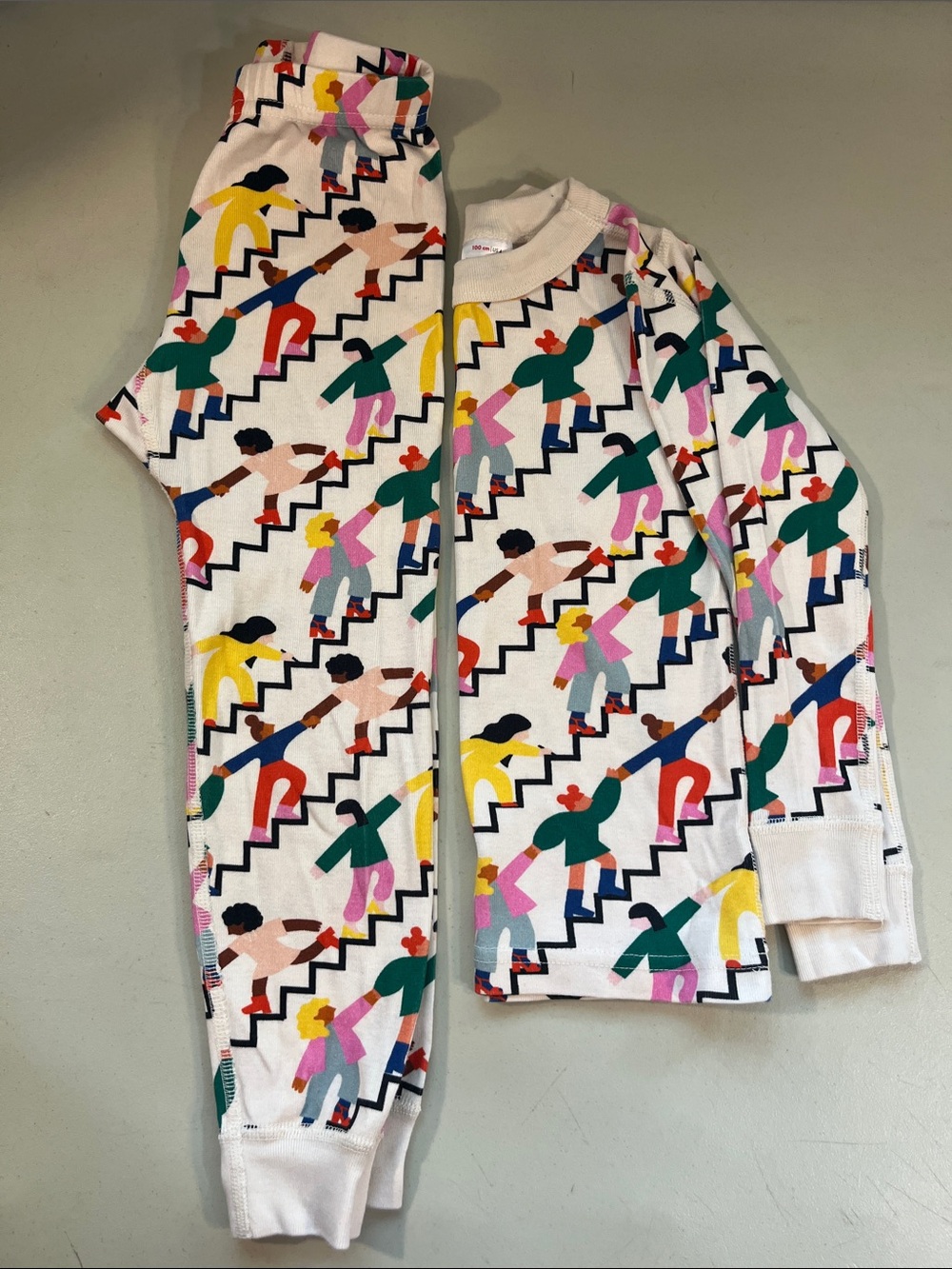 Hanna Andersson White Pajama Set with Multicolor Walking-Figure Print